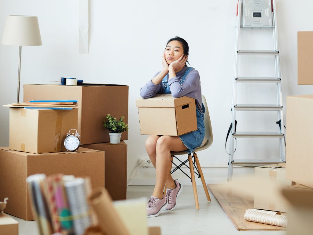 sentimental woman decluttering
