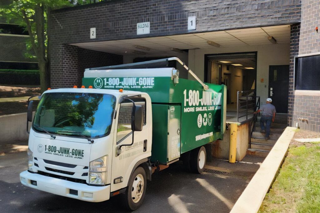 1800junkgone truck in front of a building